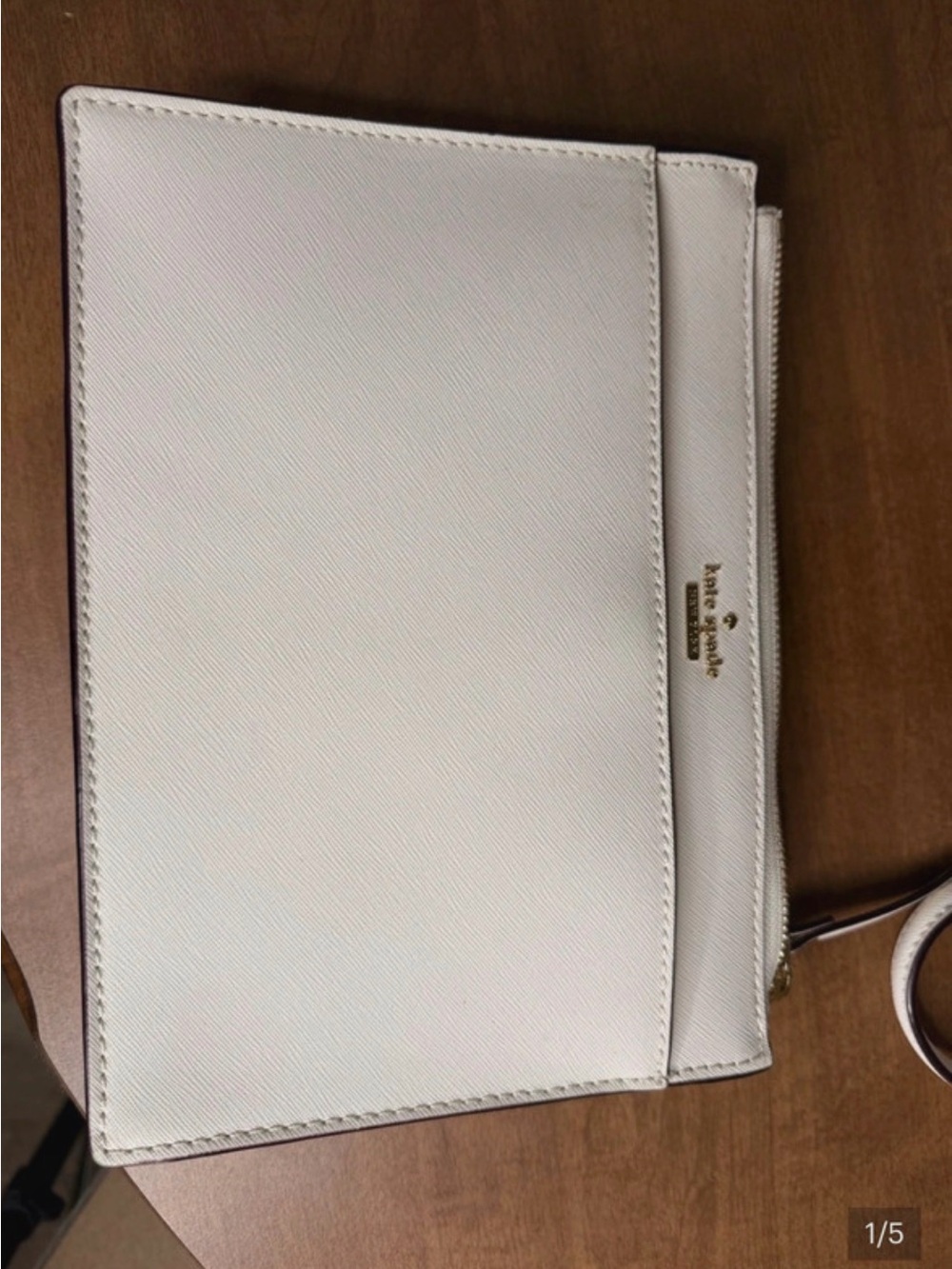 kate spade Cream Leather Wristlet Clutch with Gold Logo
